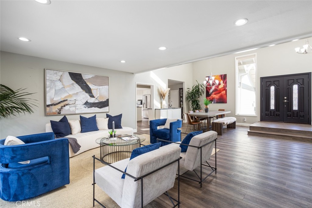 2789 Waxwing Circle Costa Mesa, CA 92626 - Photo 6 of 47 a living room with fireplace furniture and a large window