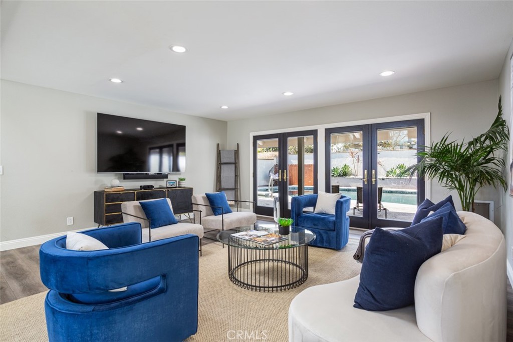 2789 Waxwing Circle Costa Mesa, CA 92626 - Photo 8 of 47 a living room with furniture and a flat screen tv