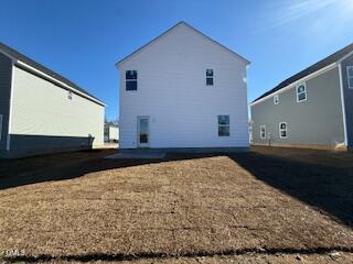 87 Stout Landing Dunn, NC 28334 - Photo 4 of 5 a bedroom with a bed and a window