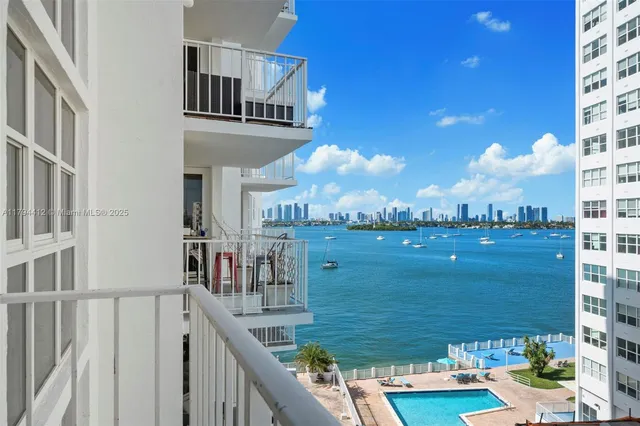 a view of a lake from a balcony