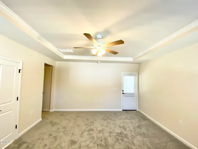 a spacious bathroom with a double vanity sink mirror and shower