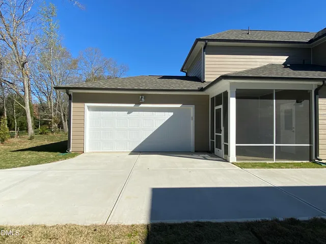 a house with yard in front of it