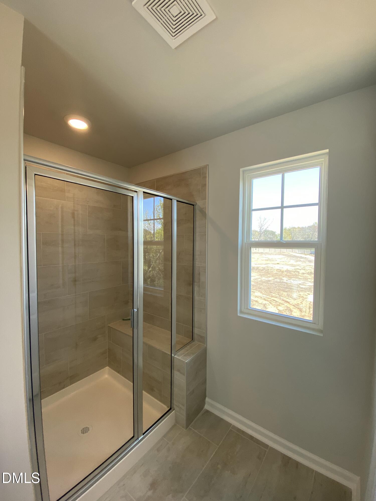 2313 Hedge Maple Drive Raleigh, NC 27603 - Photo 29 of 32 a bathroom with a shower