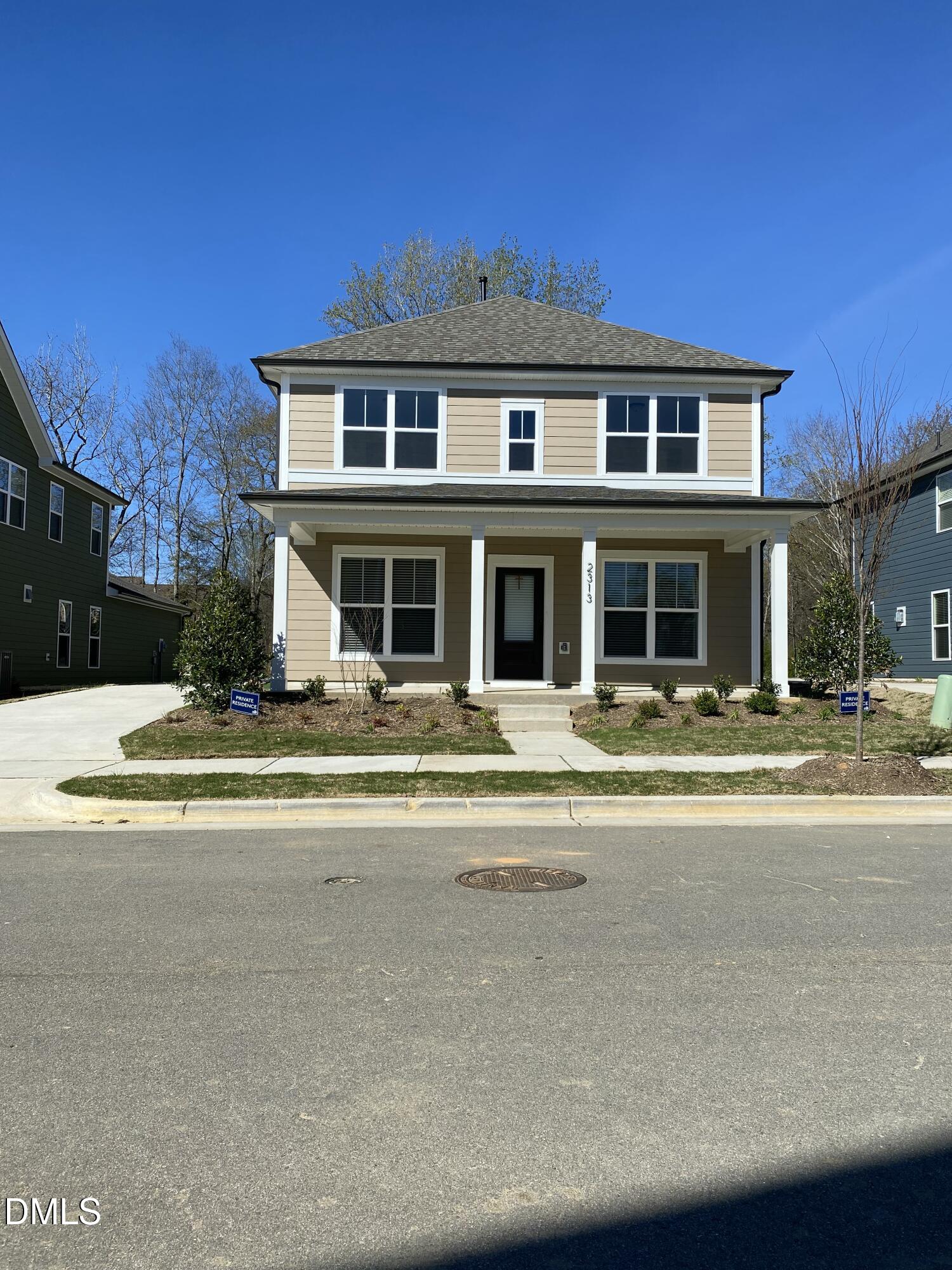 2313 Hedge Maple Drive Raleigh, NC 27603 - Photo 4 of 32 a front view of a house with a yard
