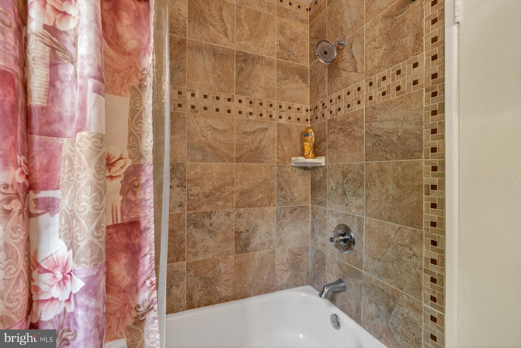 2311 Coleridge Drive Silver Spring, MD 20910 - Photo 29 of 47 Elegant tiled shower retreat.