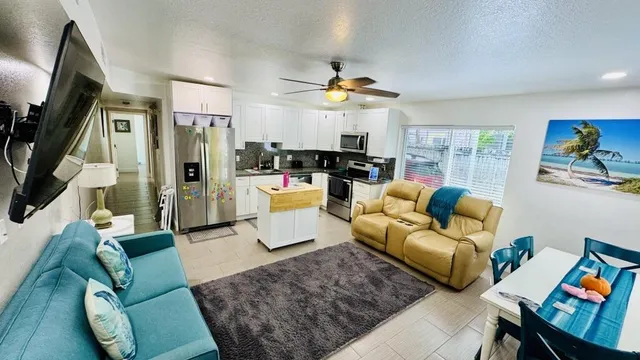 a living room with furniture and a couch