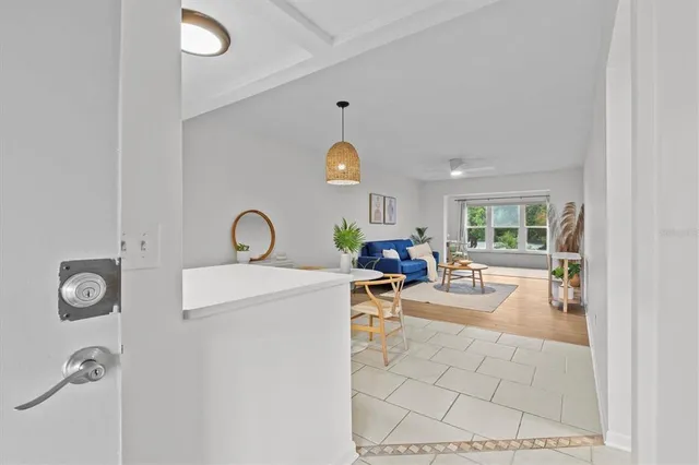 a view of living room with furniture and a window