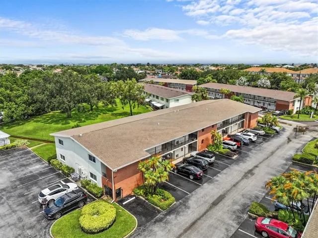 an aerial view of a house having yard