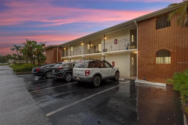 a car parked in front of a house