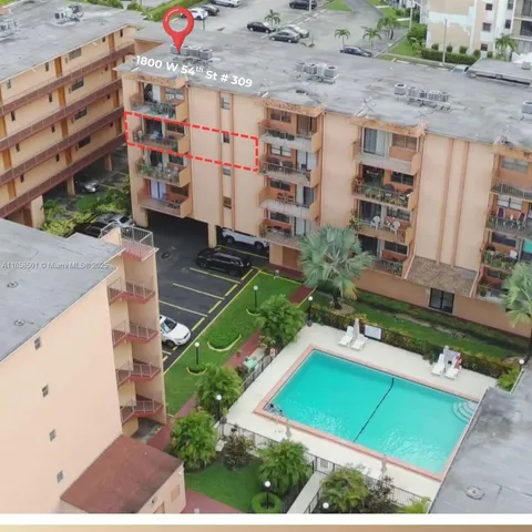 a view of building and yard