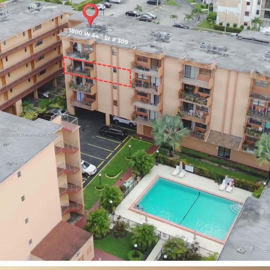 a view of building and yard