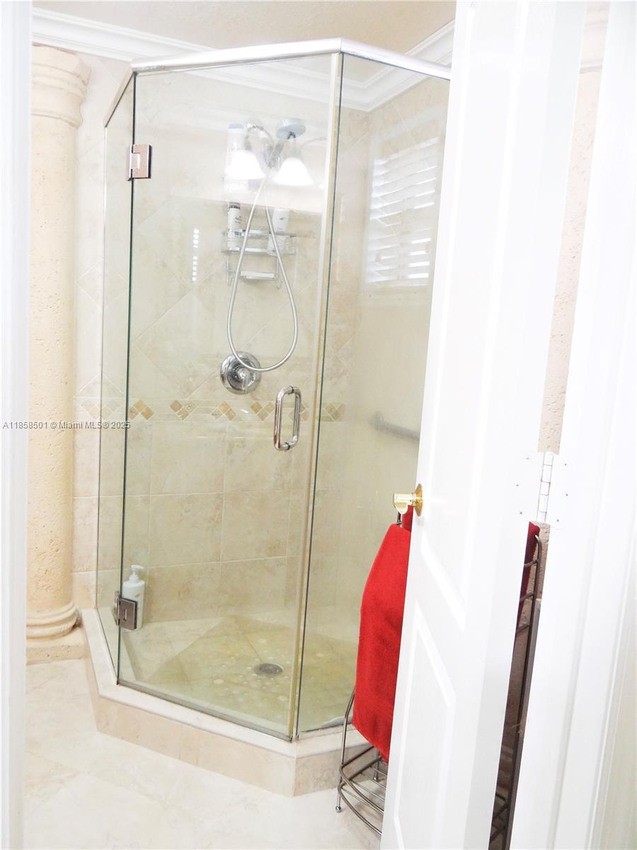 1800 West 54th Street, Unit 309 Hialeah, FL 33012 - Photo 12 of 19 a bathroom with a shower and a glass door