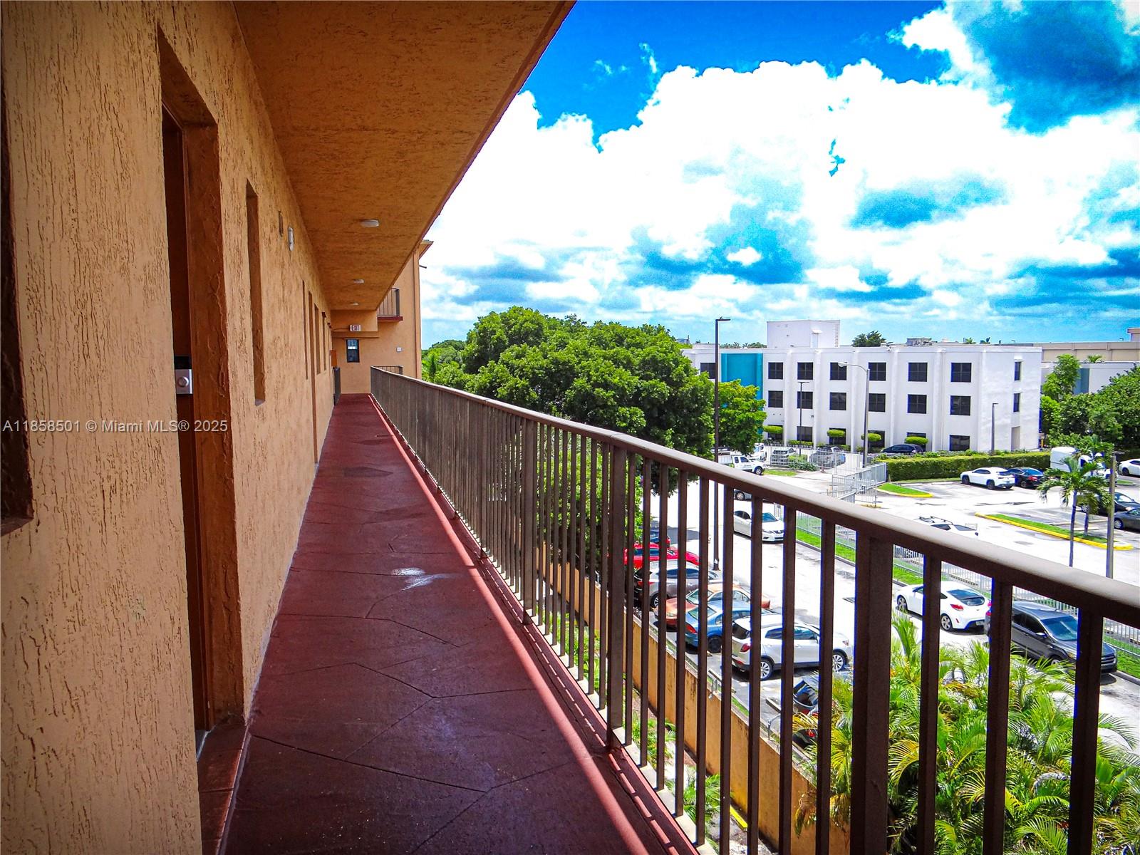 1800 West 54th Street, Unit 309 Hialeah, FL 33012 - Photo 16 of 19 a view of city from a balcony