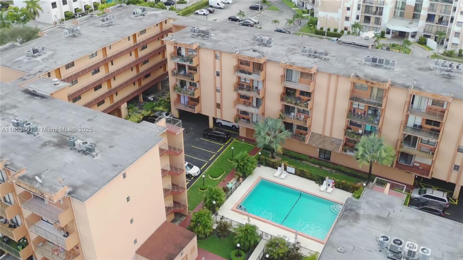 1800 West 54th Street, Unit 309 Hialeah, FL 33012 - Photo 18 of 19 an aerial view of a house