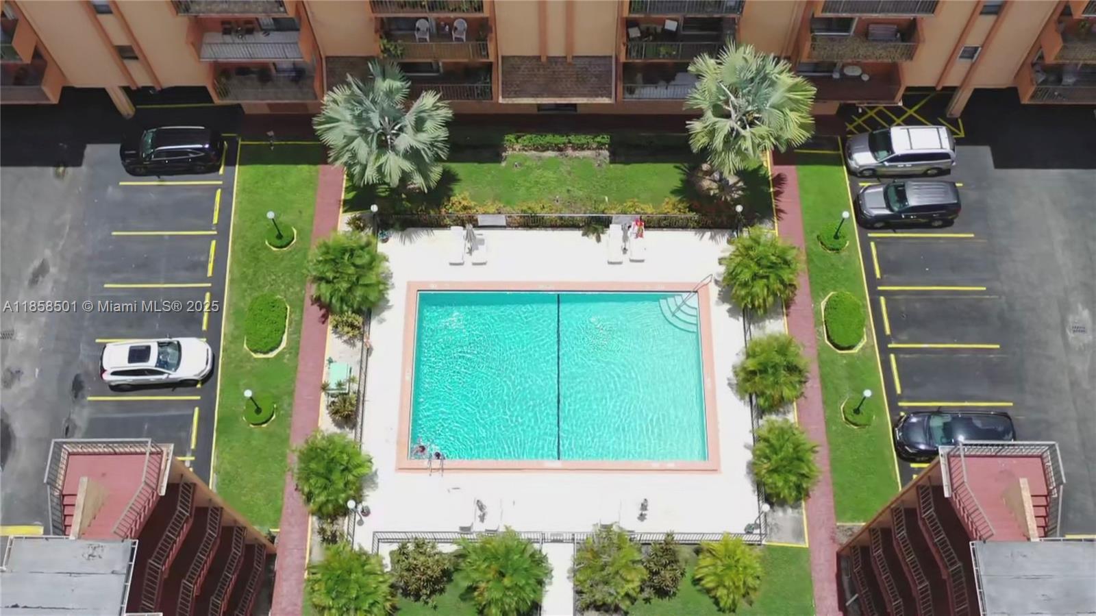 1800 West 54th Street, Unit 309 Hialeah, FL 33012 - Photo 2 of 19 aerial view of a house with street