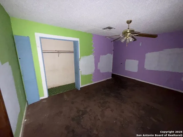 a view of a room with a hardwood