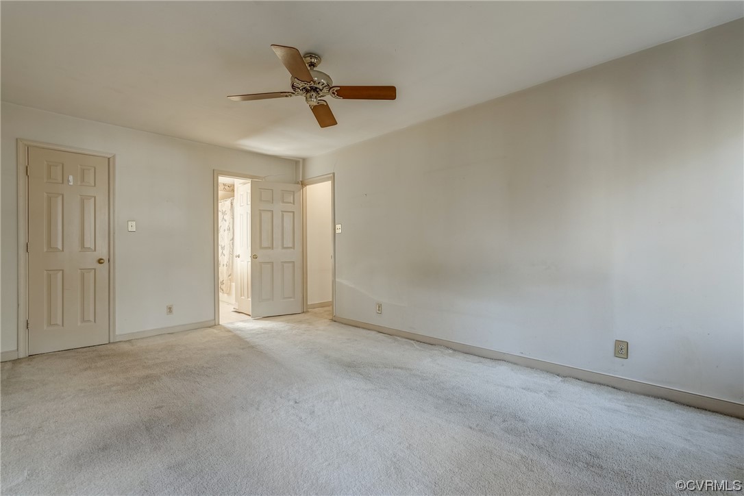 14703 Acorn Ridge Place Midlothian, VA 23112 - Photo 15 of 24 an empty room with a ceiling fan and windows