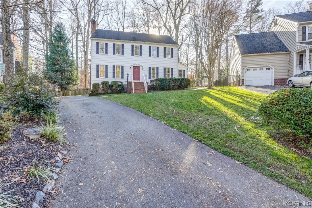 14703 Acorn Ridge Place Midlothian, VA 23112 - Photo 2 of 24 a view of an house with backyard and trees