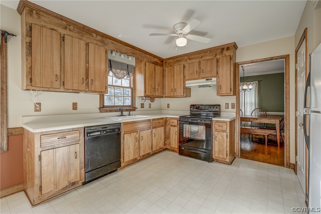 14703 Acorn Ridge Place Midlothian, VA 23112 - Photo 10 of 24 a kitchen with cabinets appliances and a window