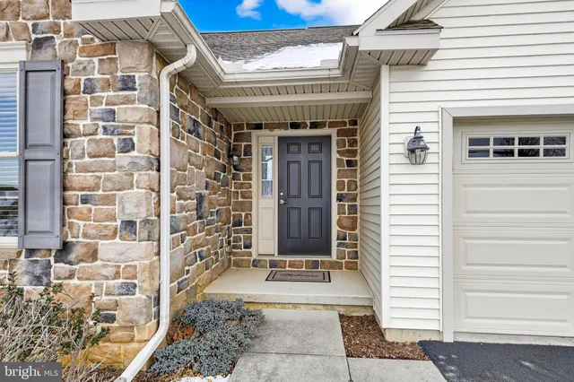 a front view of a building with a entrance