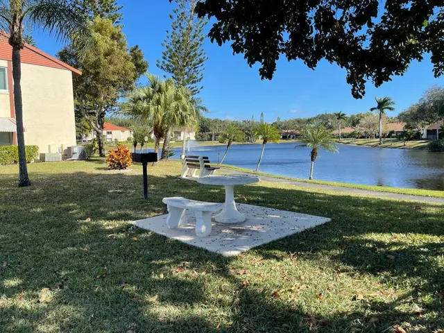 a view of a garden with an outdoor space