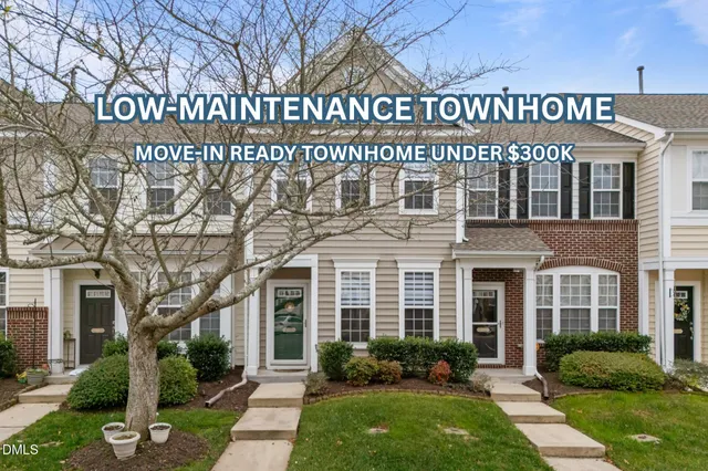 a front view of a building with garden