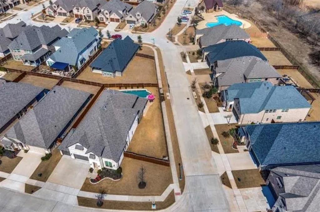 2525 Four Roses Drive Lewisville, TX 75056 - Photo 18 of 19 an aerial view of residential houses with outdoor space