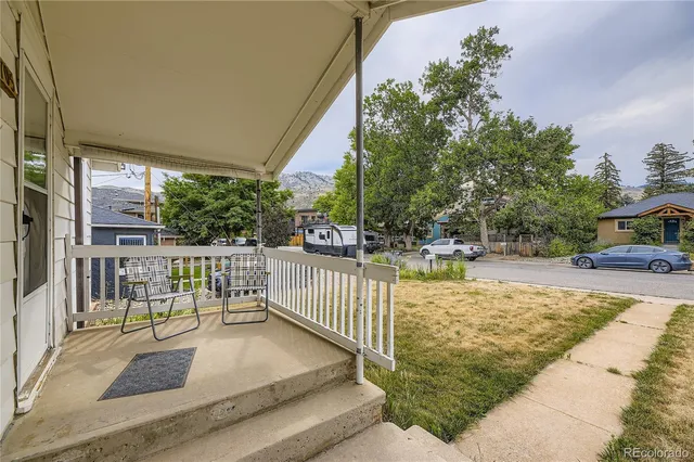 a view of a swimming pool with a patio