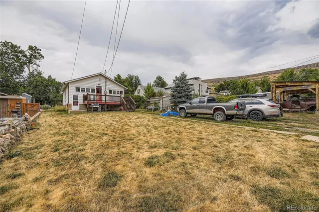 a car parked in front of a house