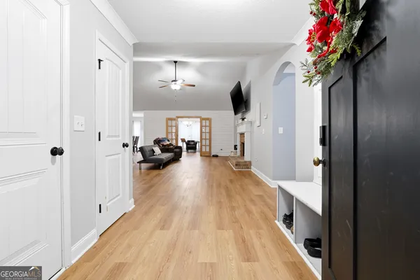 a view of a hallway view with living room