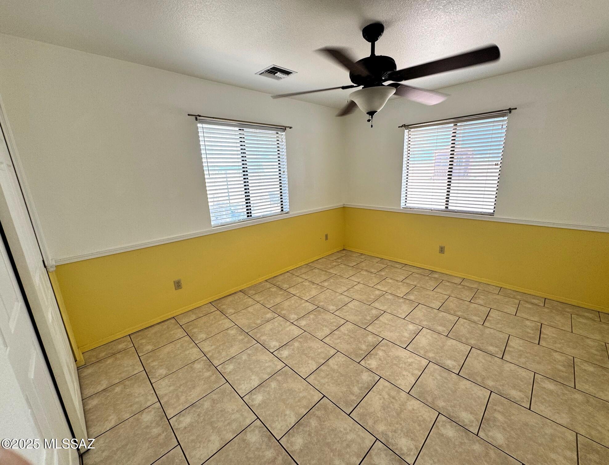 13384 South Cottonwood Road Pearce, AZ 85625 - Photo 24 of 46 a view of an empty room and a window