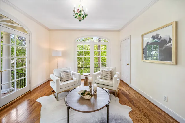 a view of an empty room and a window