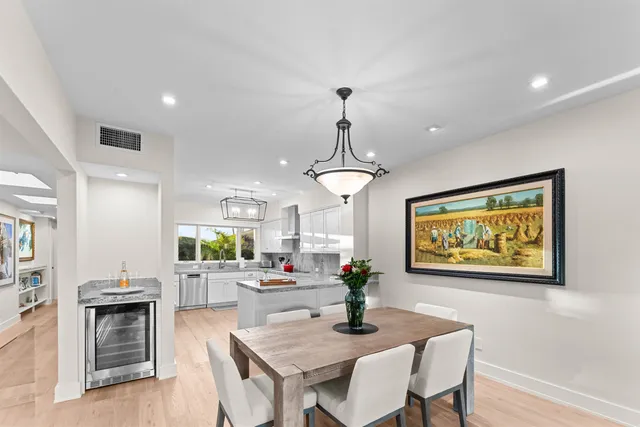 a kitchen with sink and center island