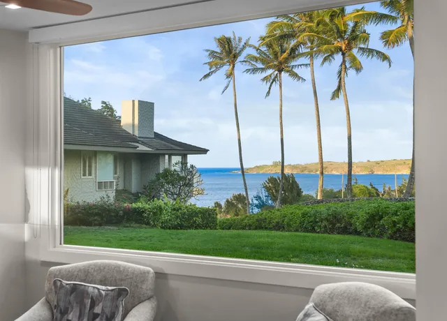 a view of a garden with a cars park