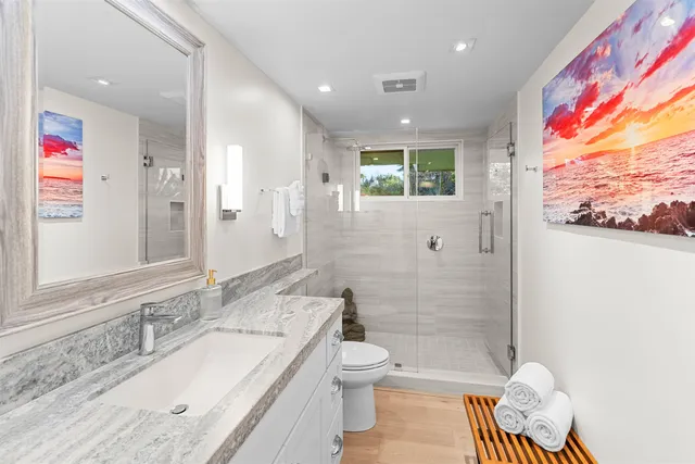 a bed room with a bed and a dresser