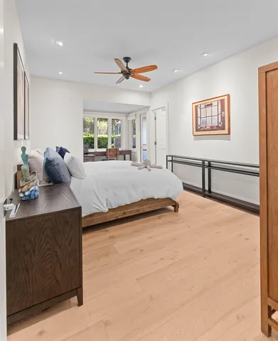 a bed room with a bed and a window