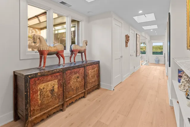 a view of a balcony with furniture and windows