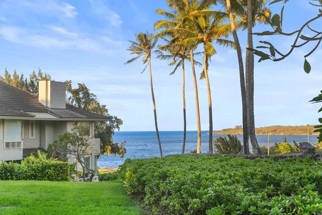 a view of a swimming pool with a lounge chairs