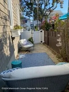 a view of a house with a yard and tree s