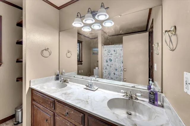 a bedroom with bed and a window