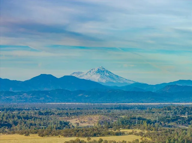 a view of lake and mountain