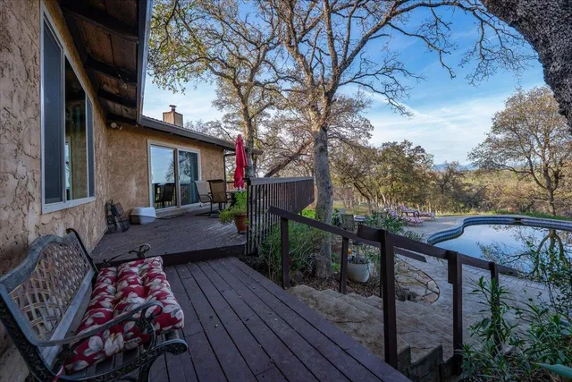 a view of a chairs on the roof deck