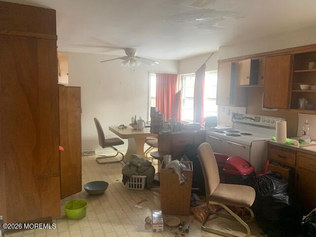 49 Court Street Freehold, NJ 07728 - Photo 3 of 7 a living room with furniture a window and a fireplace