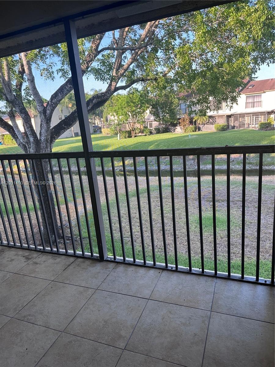 23398 Lyons Road, Unit 309 Boca Raton, FL 33428 - Photo 9 of 16 a view of a black gate