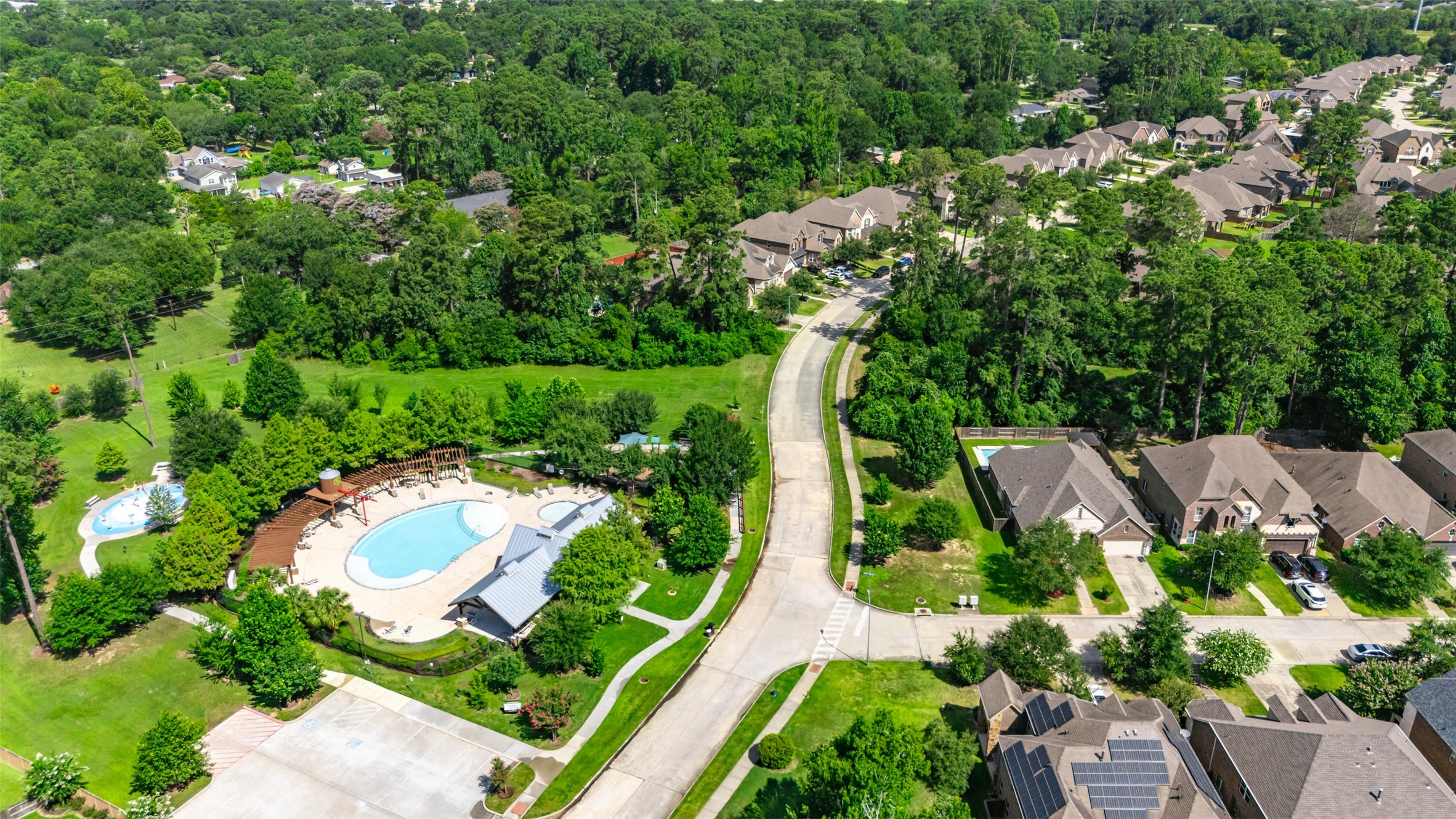 22419 Sawmill Ranch Drive Spring, TX 77389 - Photo 40 of 45 A short walk to the pool and splashpad.