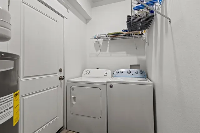 a utility room with dryer and washer