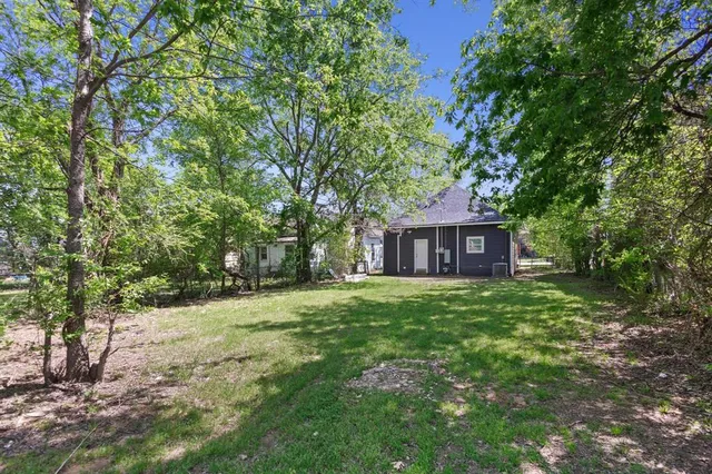 a fire hydrant in the middle of a field