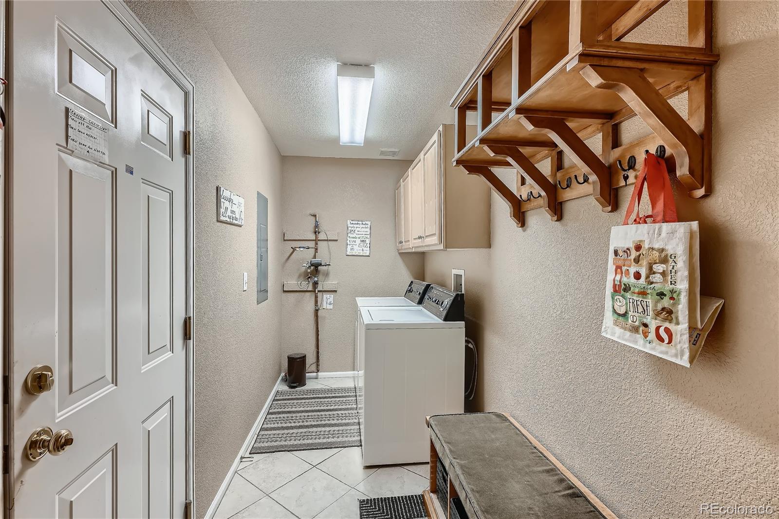 166 Whitehaven Circle Highlands Ranch, CO 80129 - Photo 22 of 28 a view of a hallway with a workspace