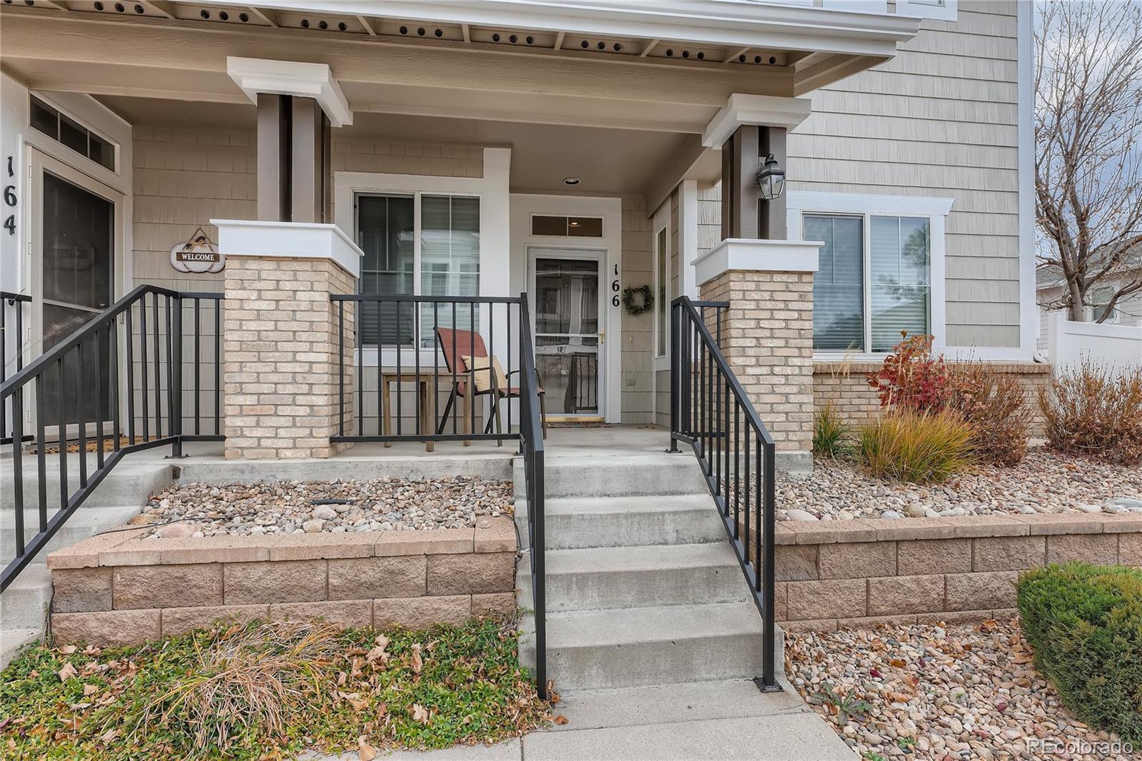 166 Whitehaven Circle Highlands Ranch, CO 80129 - Photo 3 of 28 a front view of a house