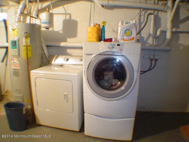 240 Crows Nest Road Manahawkin, NJ 08050 - Photo 18 of 26 a utility room with dryer and washer